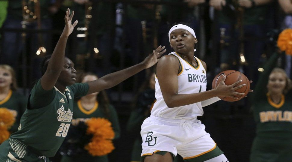 Baylor forward NaLyssa Smith, right, looks to the basket over USF forward Bethy Mununga, left, in the first half of an NCAA college basketball game, Tuesday, Nov. 19, 2019, in Waco, Texas. (AP Photo/Rod Aydelotte)