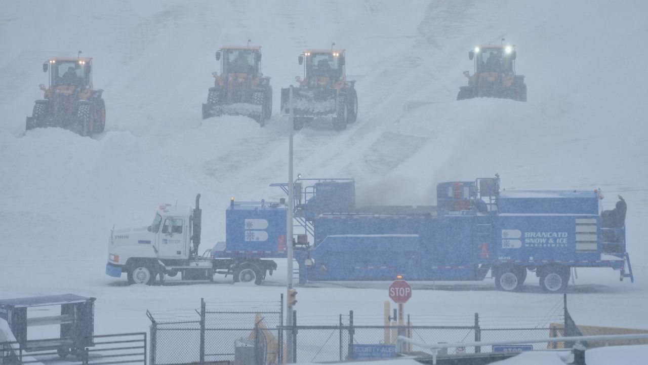 More than 10,800 flights canceled Sunday as massive winter storm sweeps across U.S.