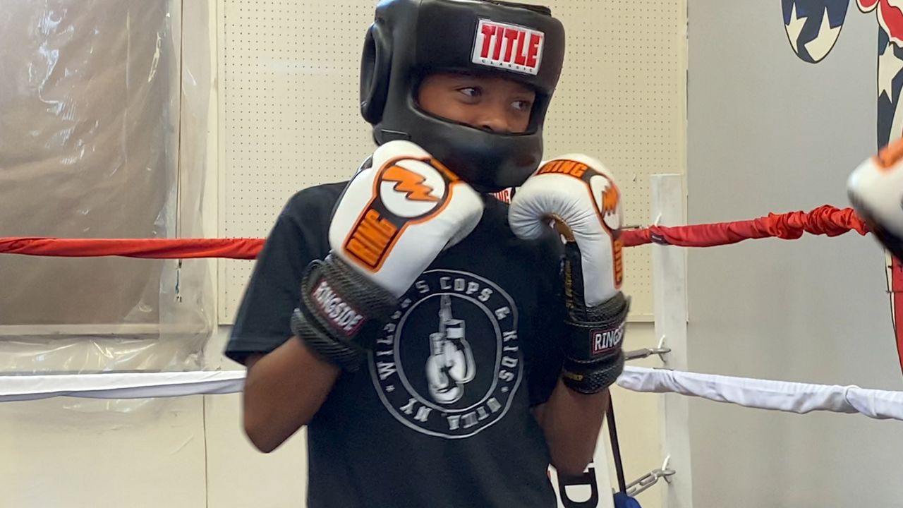 Utica boxing program keeps police, kids active