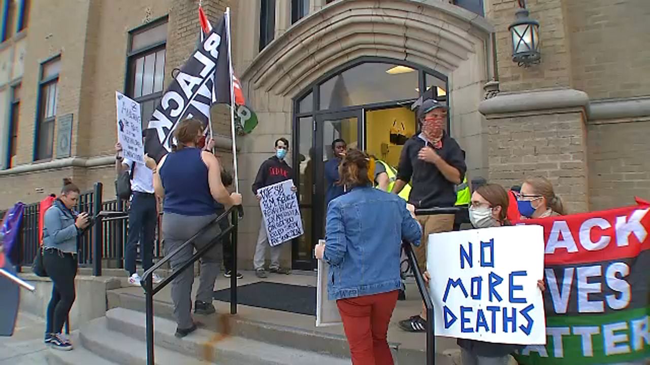 Protesters Rally for Man Killed by Utica Police in 2005