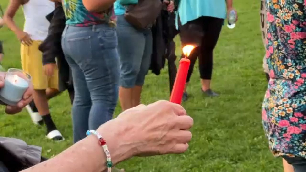 Mourners in Utica honored the memory of a local elementary school principal, Elizabeth Gerling, on Monday night. (Spectrum News 1)