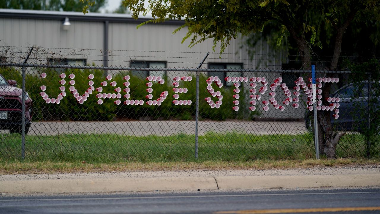 A "Uvalde Strong" message is posted in front of the Uvalde County Mental Health building, Tuesday, July 12, 2022, in Uvalde, Texas. (AP Photo/Eric Gay)