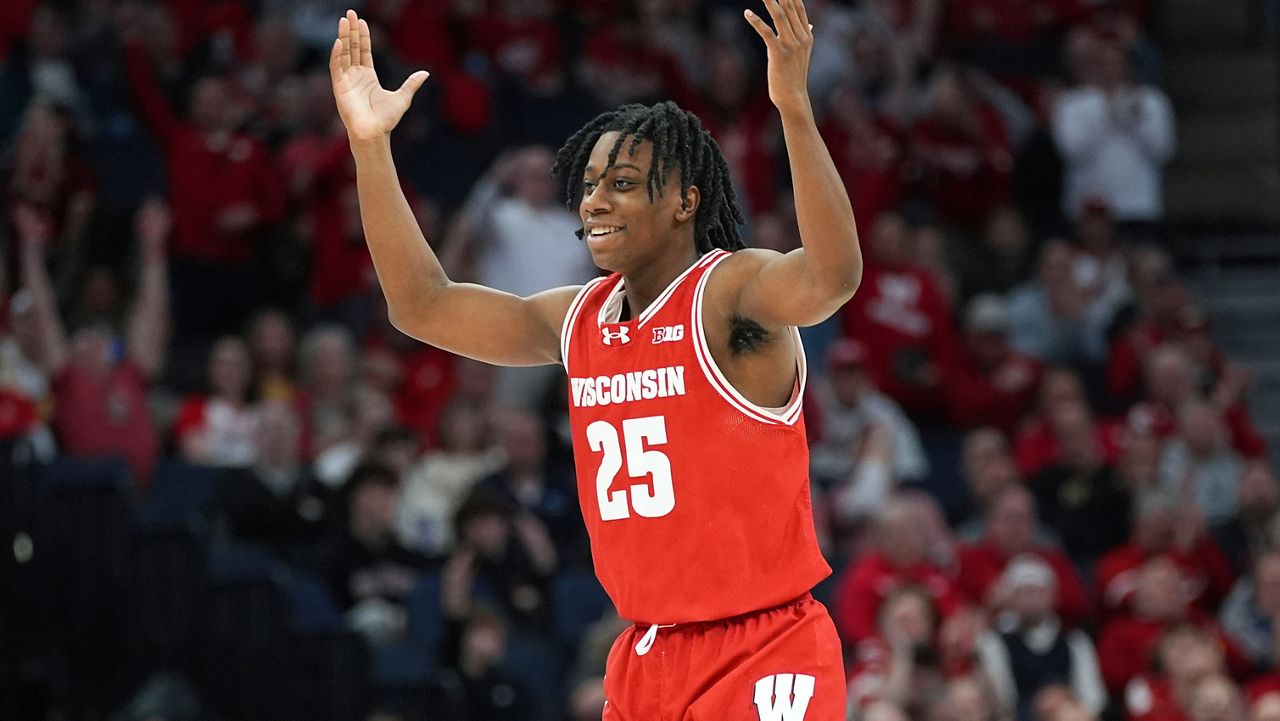 Wisconsin guard John Blackwell celebrates after making a 3-point basket during the second half of an NCAA college basketball game against Northwestern in the quarterfinal round of the Big Ten Conference tournament, Friday, March 15, 2024, in Minneapolis. (AP Photo/Abbie Parr)