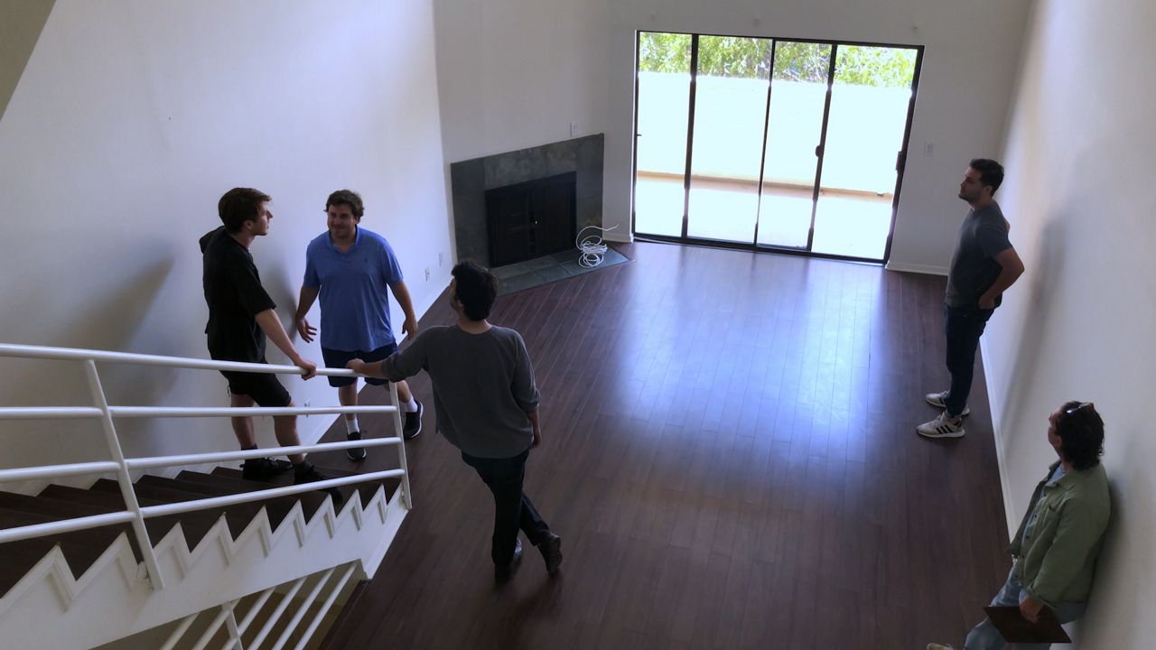 Friends looking for an apartment.