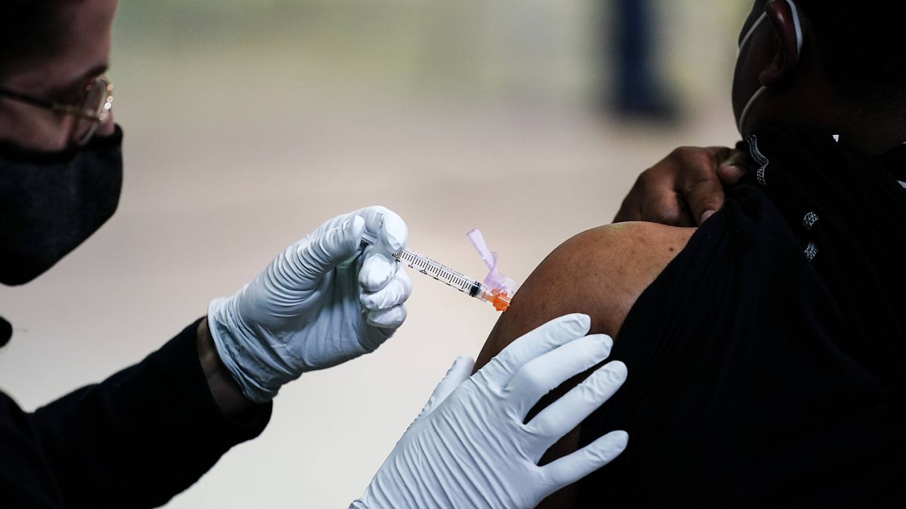 A vaccine shot is administered. (AP/File)