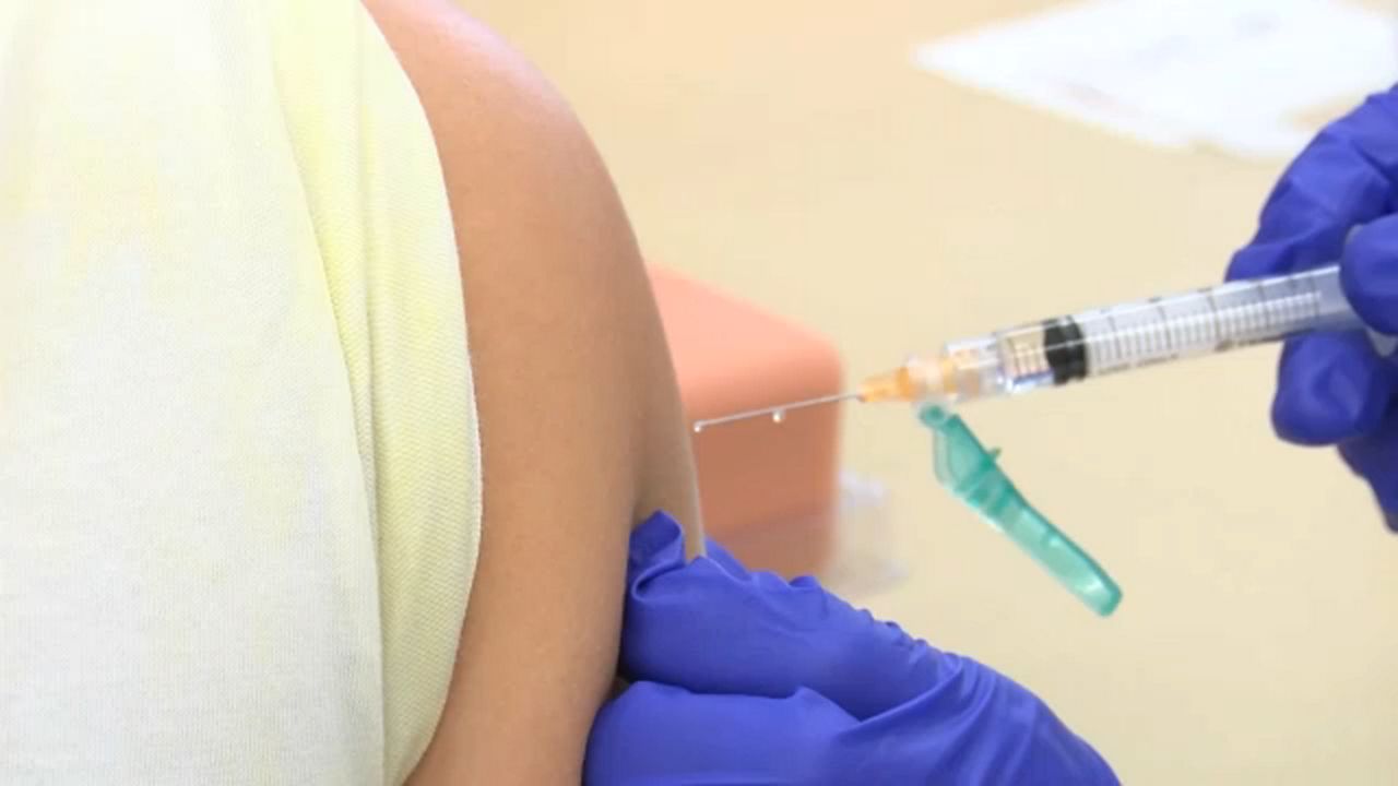 A needle going into an arm