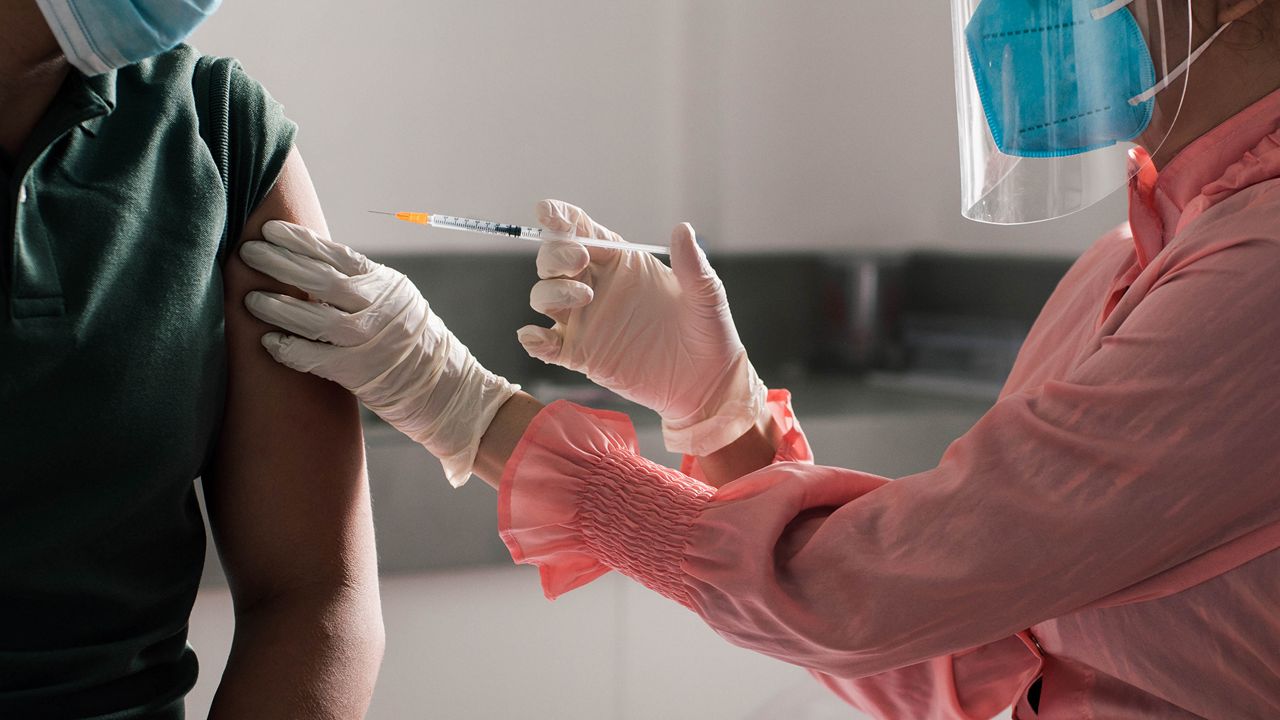 A nurse administering the COVID vaccine can be seen in this file photo. (Getty Images)