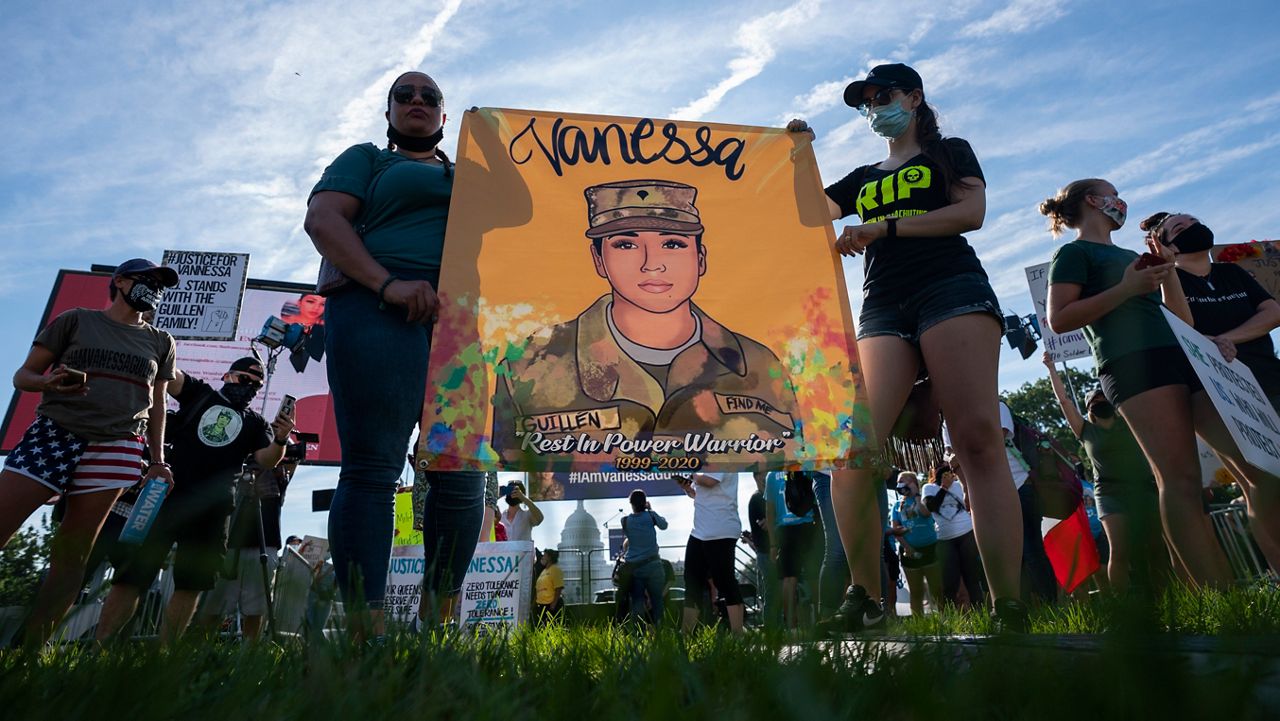 Supporters of the family of slain Army Spc. Vanessa Guillen gather before a news conference on the National Mall in front of Capitol Hill, on July 30, 2020, in Washington.