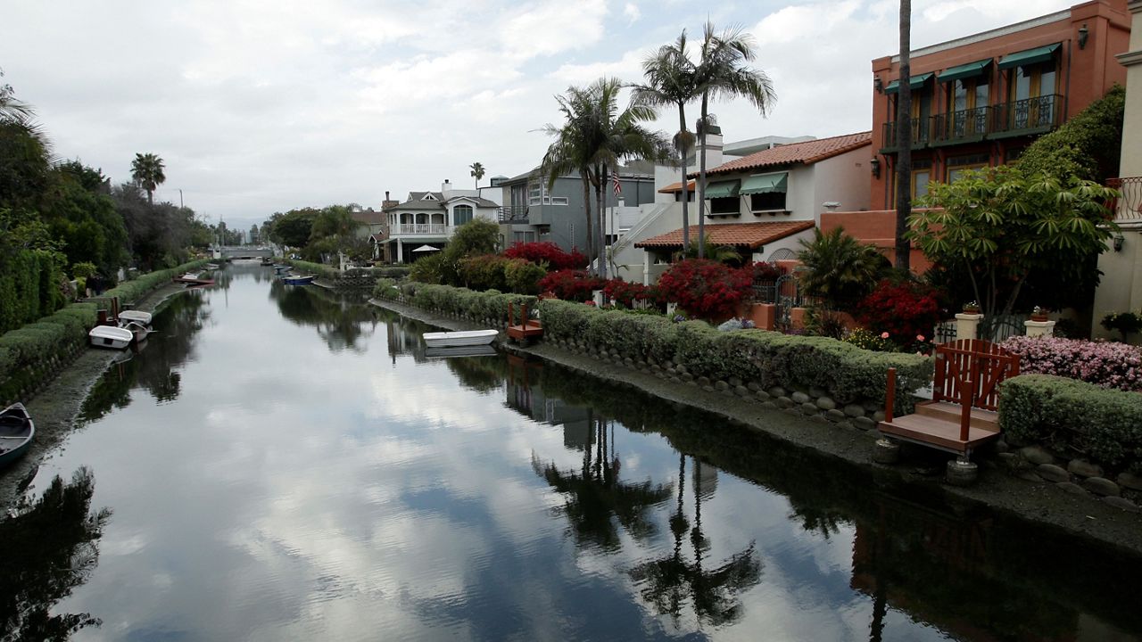 This April 7, 2009 photo shows a canal in the Venice section of Los Angeles. (AP Photo/Damian Dovarganes)