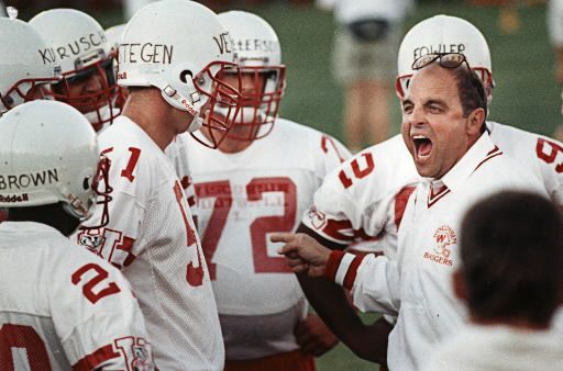 Mike Verstegen (51) and teammates getting an earful from first-year coach Barry Alvarez.