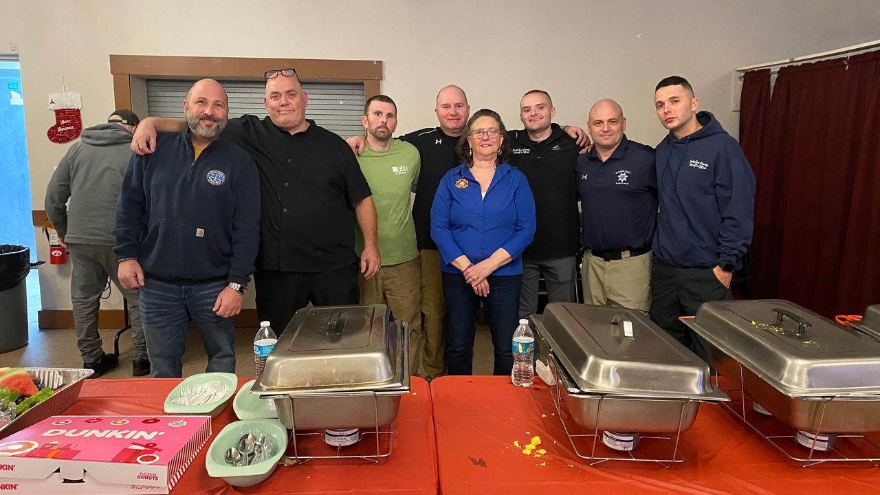Chris Bonnivier and some from the Berkshire County Sheriffs and Probation office setting up the breakfast for veterans.