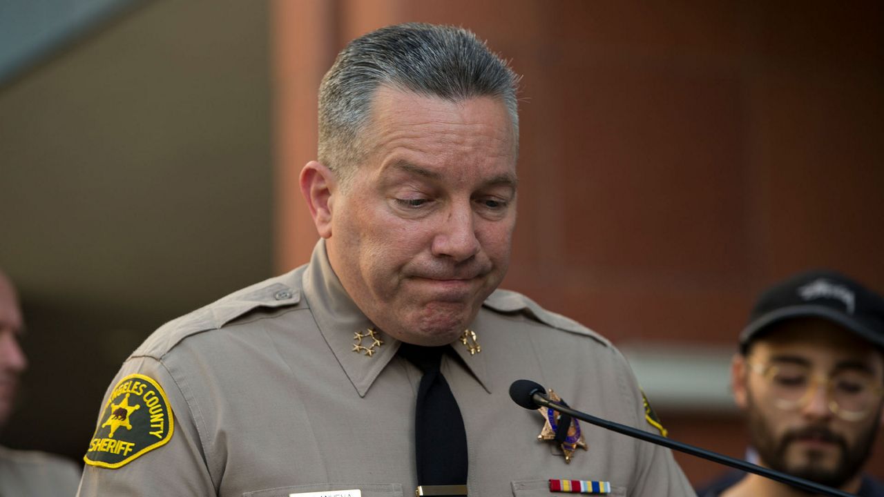 Los Angeles County Sheriff Alex Villanueva announces, Wednesday, June 12, 2019, in Los Angeles, that Deputy Joseph Gilbert Solano, who had been on life support, has died. Solano was shot in an off-duty attack at a fast-food restaurant on Monday. (AP Photo/Damian Dovarganes)
