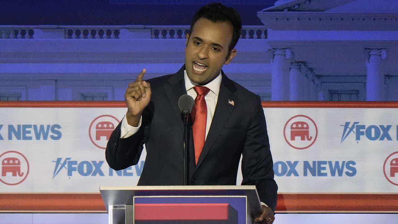 Republican presidential candidate Vivek Ramaswamy wants to eliminate several federal departments and agencies and raise the voting age to 25 unless certain conditions are met. (AP Photo/Morry Gash)