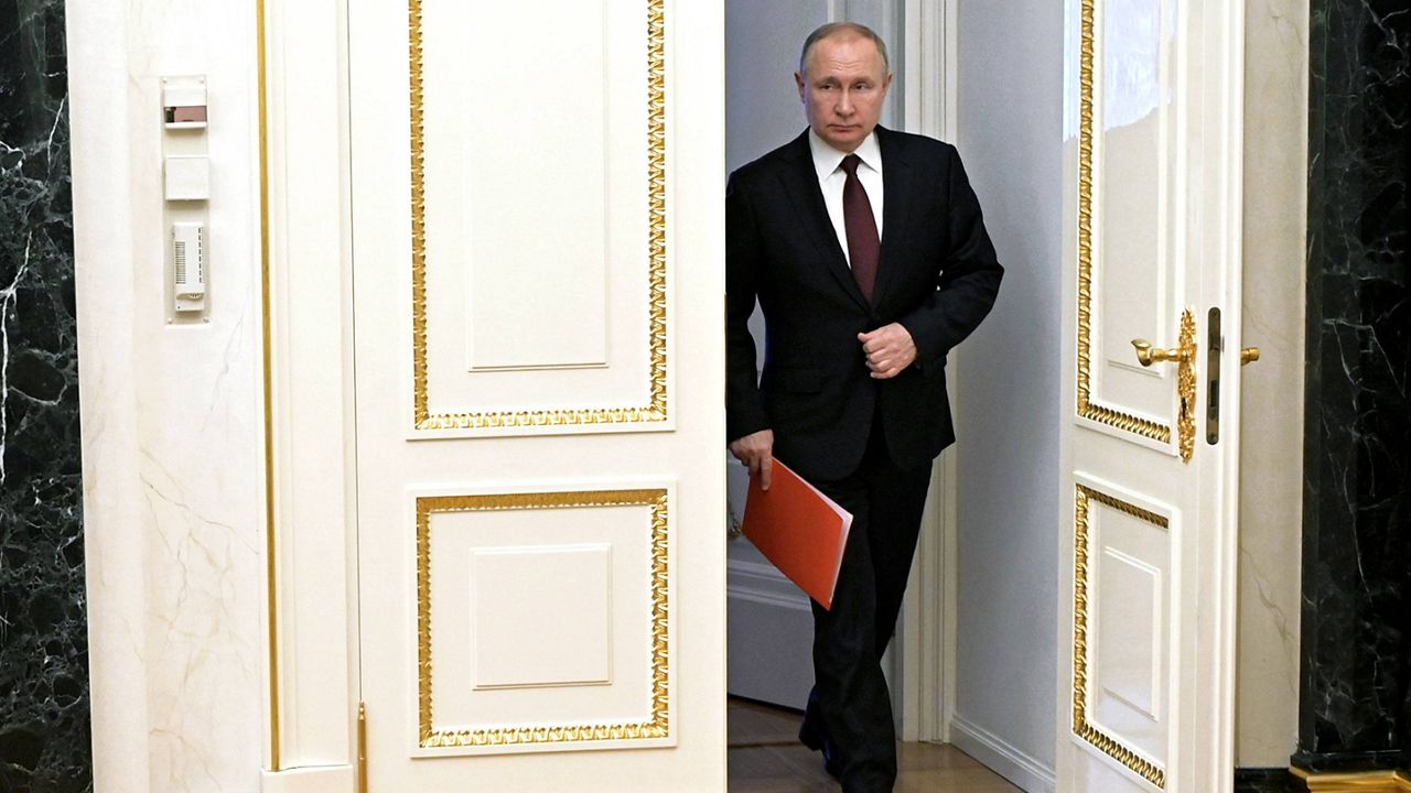 Russian President Vladimir Putin enters a hall to chair a Security Council meeting in Moscow on Friday. (Alexei Nikolsky, Sputnik, Kremlin Pool Photo via AP, File) 