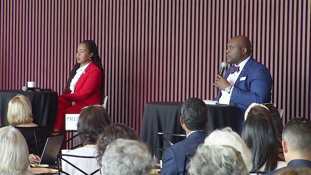 Former State Attorney Monique Worrell (left) and incumbent State Attorney Andrew Bain (right) debate in Orlando. (Spectrum News)