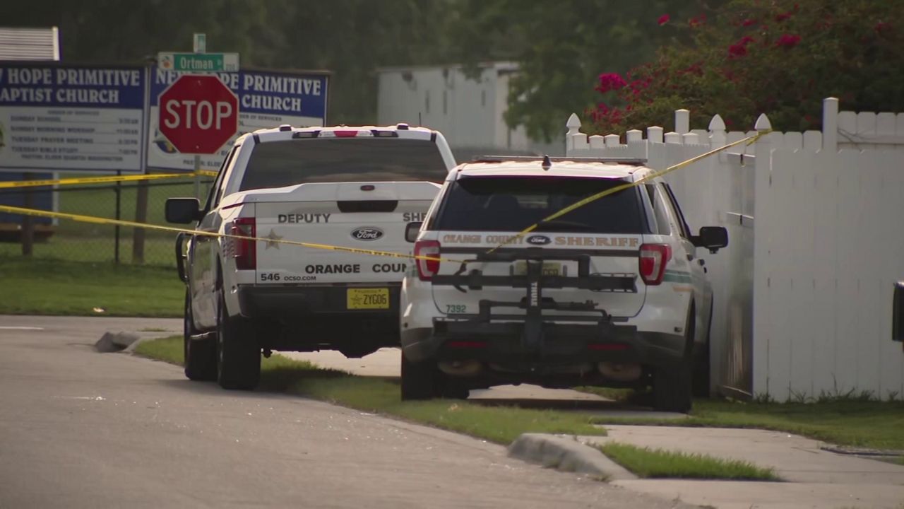 Orange County Sheriff's Office patrol vehicles parked at North Ortman Drive. (Spectrum News)