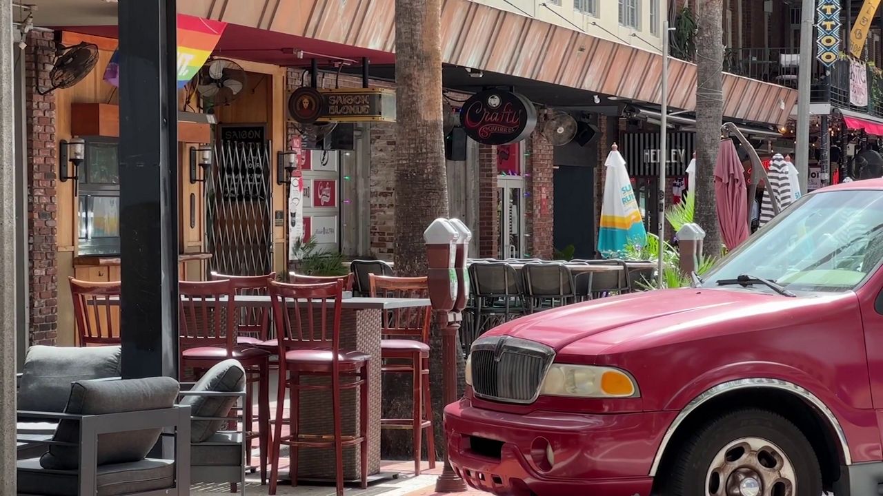 Bars along the 200 block of Central Avenue in downtown St. Petersburg. Police say they are moving rideshare drop-offs and pickups away from that strip to improve safety during nightlife. (Spectrum News)