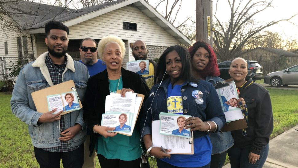 Supporters of Sen. Elizabeth Warren from the Greater Faith Institutional Church in San Antonio canvass a neighborhood in this image from February 2020. (Chris Grisby/Spectrum News)
