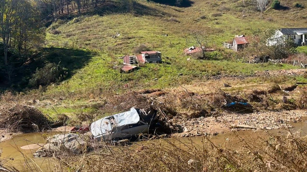 Volunteers have been finding cars and other large debris in rivers after the flooding from Helene. (Spectrum News 1)