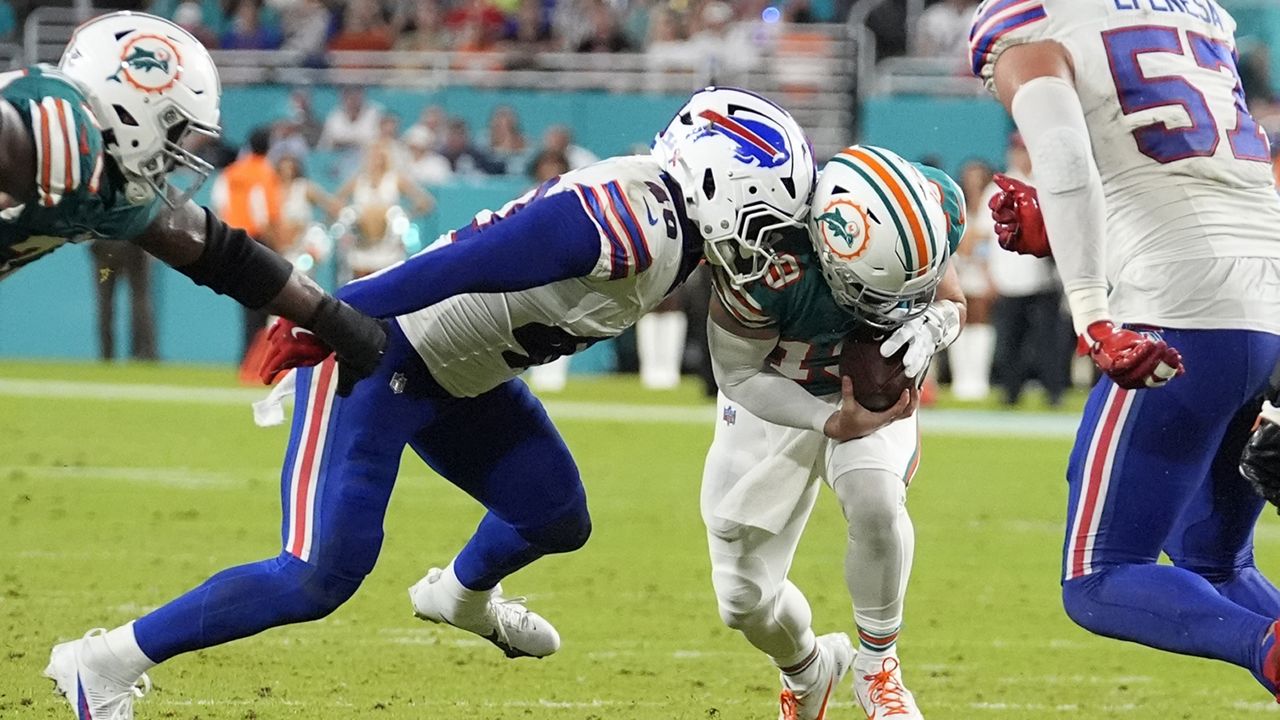 Buffalo Bills linebacker Von Miller (40) sacks Miami Dolphins quarterback Skylar Thompson (19) during the second half of an NFL football game, Thursday, Sept. 12, 2024, in Miami Gardens, Fla. (AP Photo/Rebecca Blackwell)