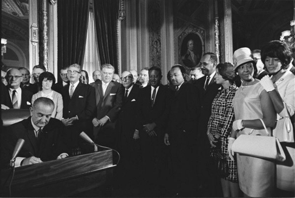 President Lyndon B. Johnson signs the Voting Rights Act of 1965. (U.S. Library of Congress)