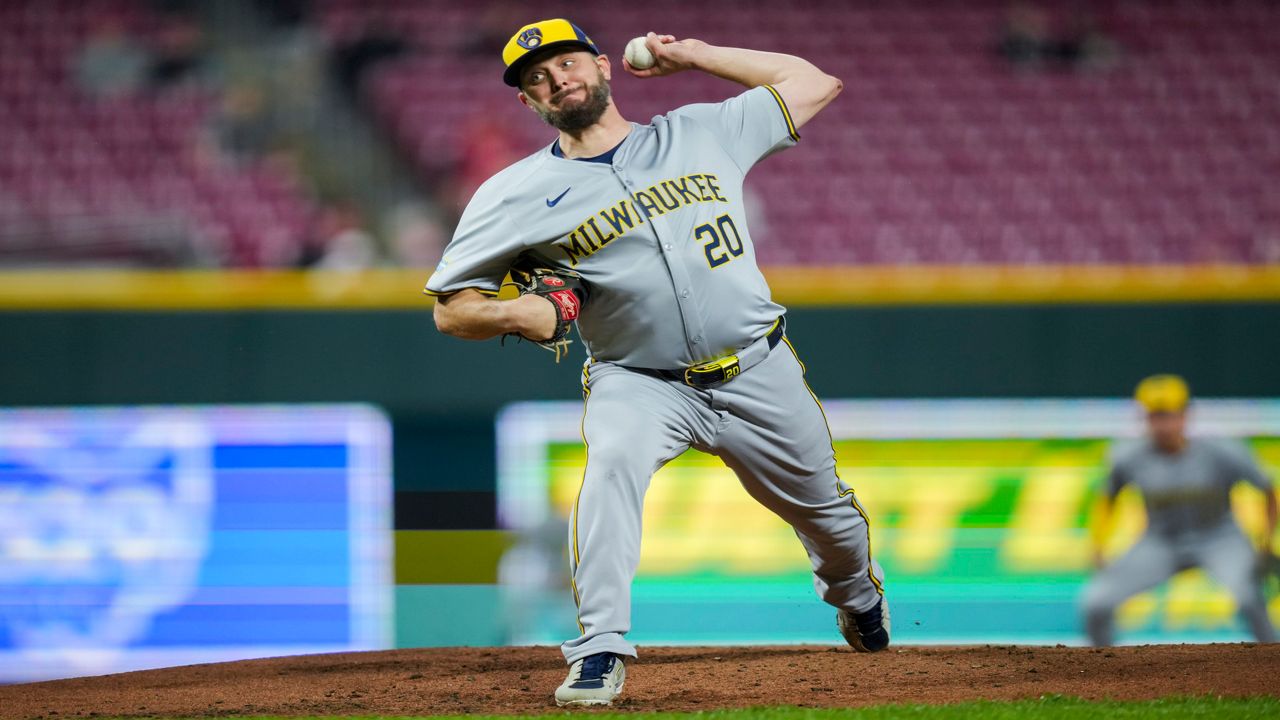 Milwaukee Brewers' Wade Miley throws during the first inning of a baseball game against the Cincinnati Reds in Cincinnati, Wednesday, April 10, 2024. (AP Photo/Aaron Doster)