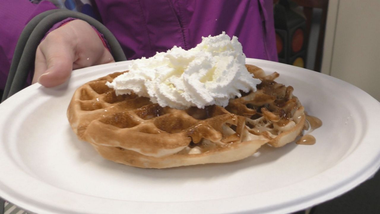 Waffles were served to teachers as part of the "Thank Our Educators" effort by Crossroads Church (Spectrum News 1/Steve France)