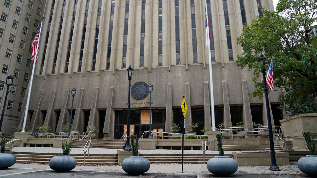 The Wake County Courthouse is shown in Raleigh, N.C., on Oct. 12, 2020. State Democrats, accused by the Green Party of meddling in its petitioning process to qualify candidates for the November ballot, filed a lawsuit Wednesday, Aug. 3, 2022, asking a state court to overturn an elections board vote granting the Green Party official recognition. (AP Photo/Gerry Broome, File)