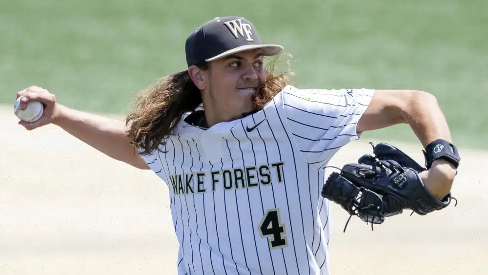 Wake Forest's Rhett Lowder (4) pitches during an NCAA baseball game on Sunday, April 9, 2023, in Winston-Salem, N.C. Projected top-10 draft pick Rhett Lowder leads the nation in pitching wins (13). (AP Photo/Ben McKeown, File)
