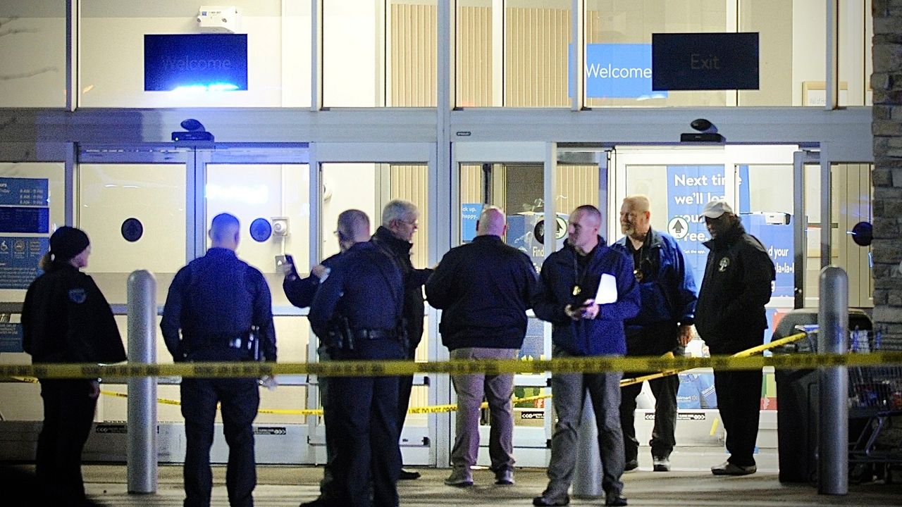 Police respond to the scene of a shooting on Monday, Nov. 20, 2023 in Beavercreek, Ohio. Police say a shooter opened fire at a Walmart, wounding four people before apparently killing himself. The attack took place Monday night at a Walmart in Beavercreek, in the Dayton metropolitan area. (Marshall Gorby/Dayton Daily News via AP)