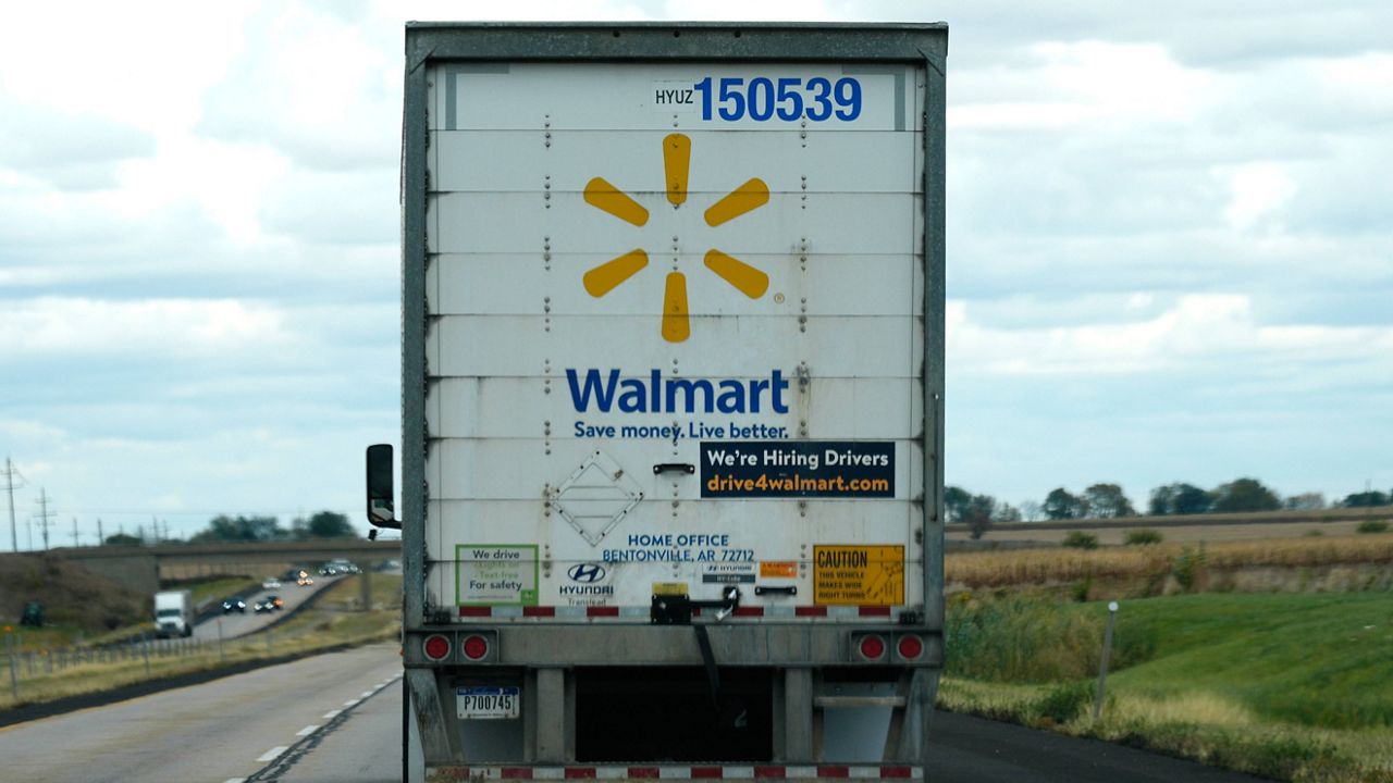 A Walmart truck in Franklin Grove, Ill., advertises that the retailer is looking to hire additional dirvers on Monday, Oct. 14, 2024. (AP Photo/Nam Y. Huh)