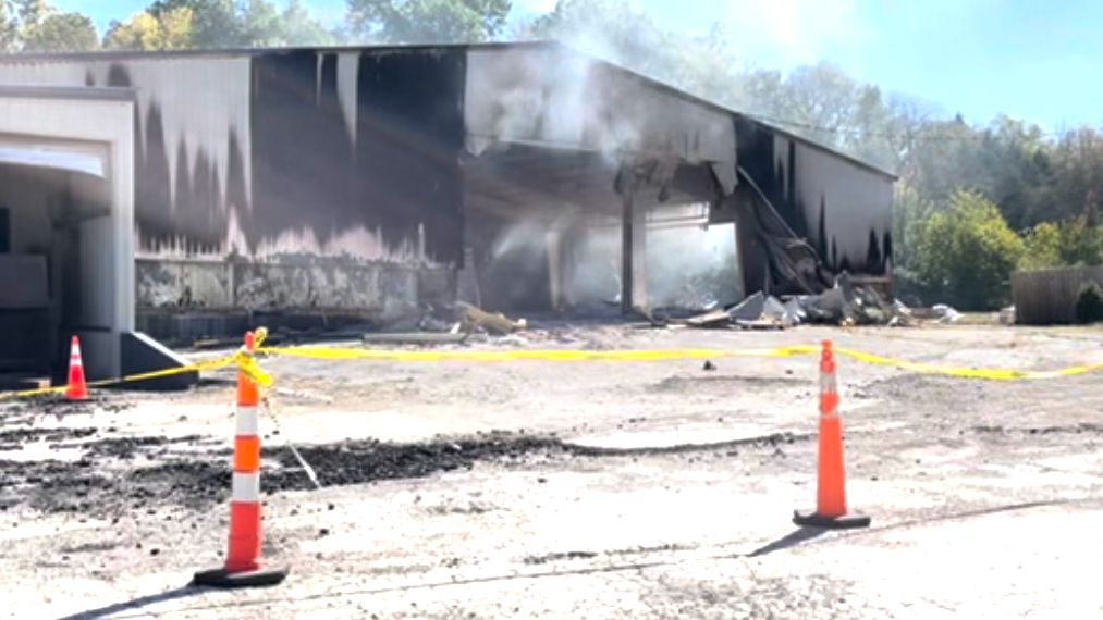 Warehouse still smoldering after charcoal and supplies for Blues Hog went up in flames in New Haven, Mo. (Spectrum News/Elizabeth Barmeier)