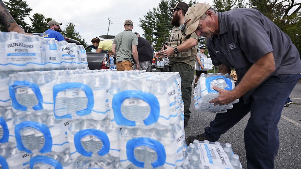 Volunteers donate water in Asheville (Associated Press)