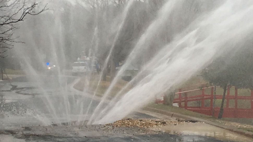 A South Austin water main break is shooing water into the air. (Spectrum News/Ed Keiner)