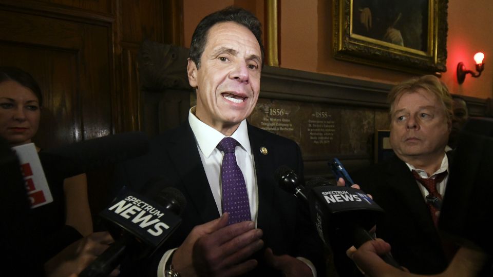 New York Gov. Andrew Cuomo speaks to reporters on the opening day of the legislative session at the Capitol, Wednesday, Jan. 9, 2019, in Albany, N.Y. 