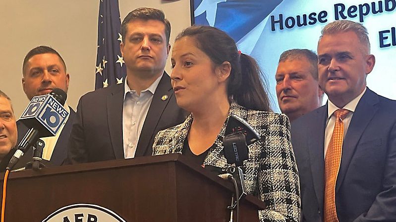 U.S. Rep. Elise Stefanik speaks with reporters in the Rensselaer County Office building Friday, which houses her new district office.