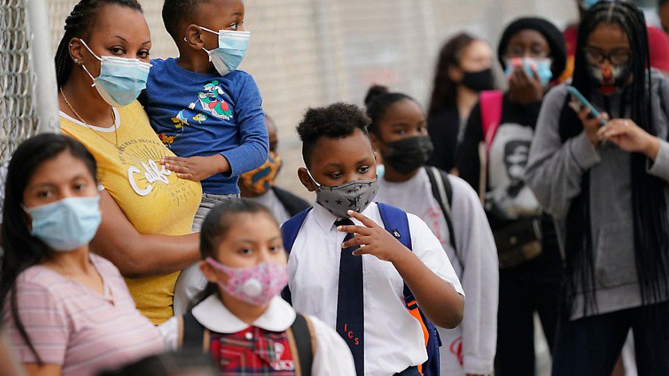 Students wear facial masks in this file image. (Spectrum News 1/FILE)