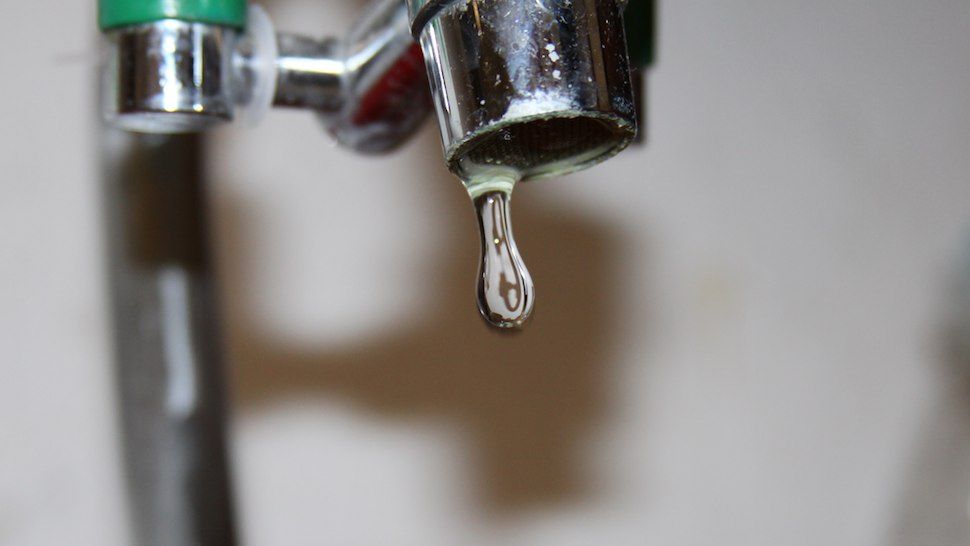 Water drips from a faucet in this generic graphic (Spectrum News images)