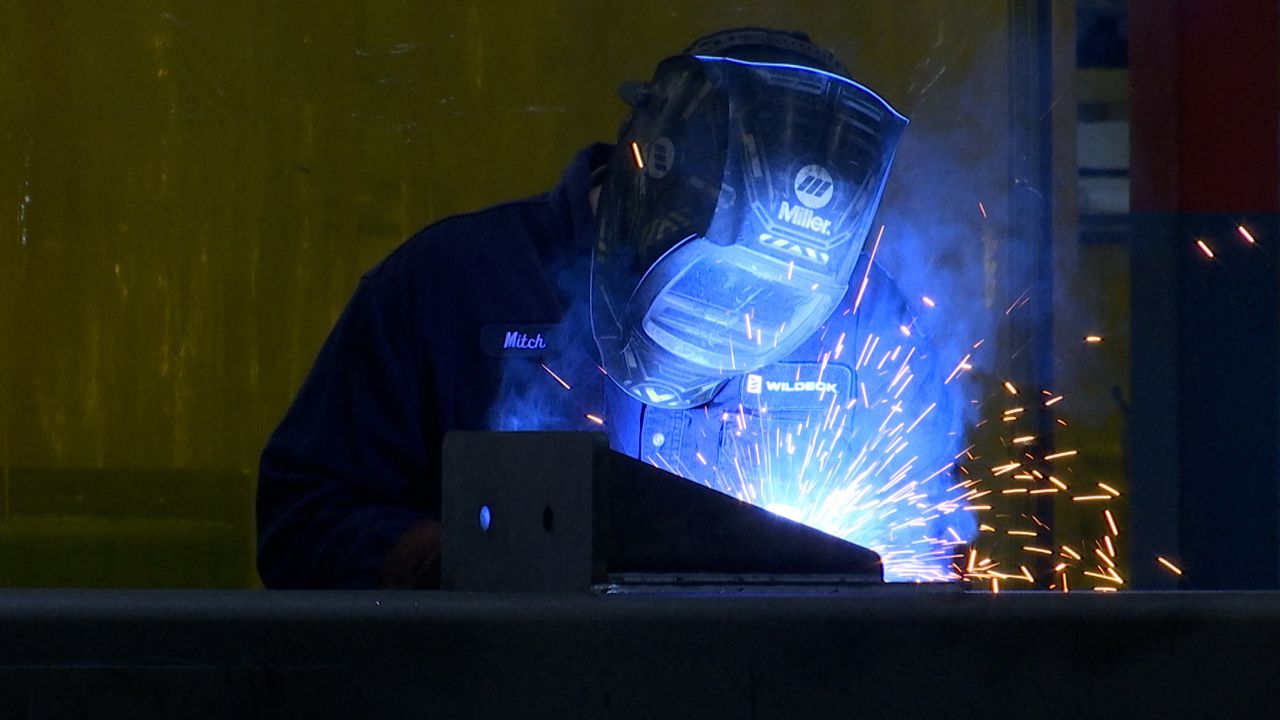 A welder works at Wildeck