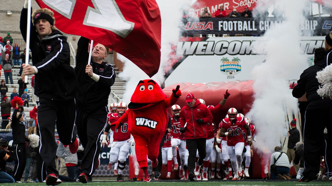 Western Kentucky mascot Big Red leads the team out on the field before the Conference USA championship NCAA college football game against Louisiana Tech, Saturday, Dec. 3, 2016, at L.T. Smith Stadium in Bowling Green, Ky. (AP Photo/Michael Noble Jr.)
