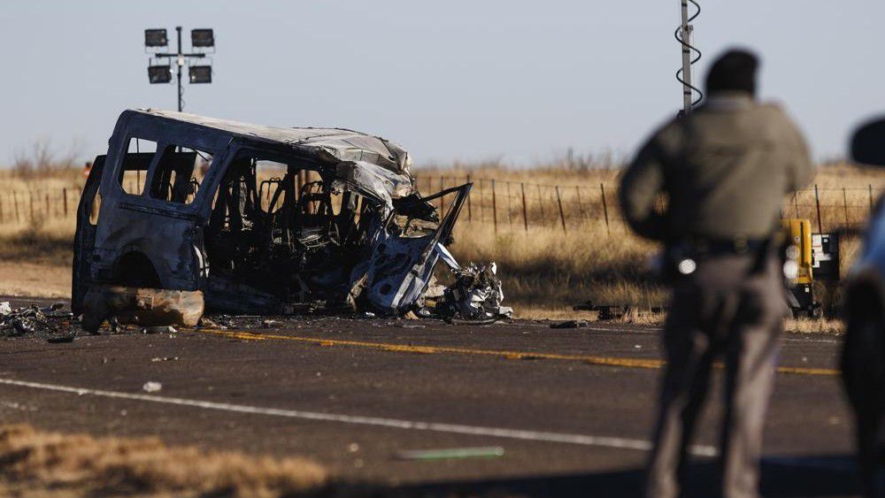 Texas Department of Public Safety Troopers look over the scene of a fatal car wreck early Wednesday, March 16, 2022 half of a mile north of State Highway 115 on Farm-to-Market Road 1788 in Andrews County, Texas. (Eli Hartman/Odessa American via AP)