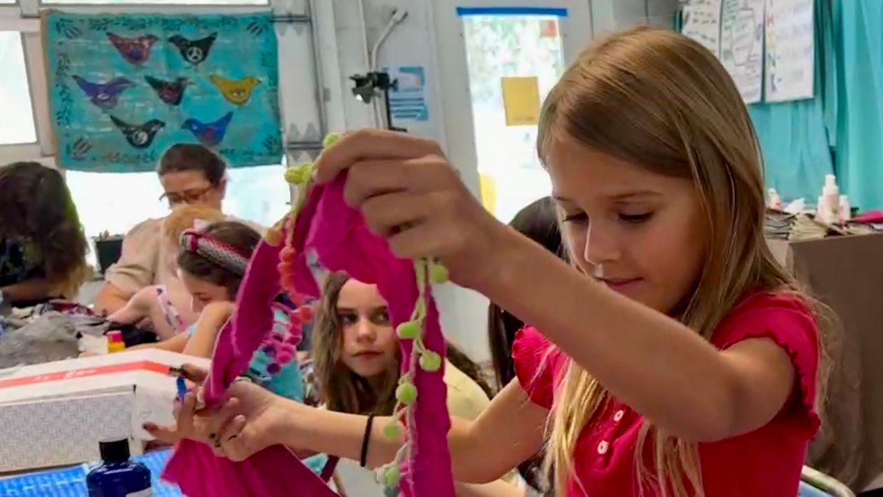 Upcycling summer camps at the Safety Harbor Art & Music Center. The center started at Whimseyland, a few blocks away, but soon outgrew the space. (Spectrum Bay News 9/Virginia Johnson)