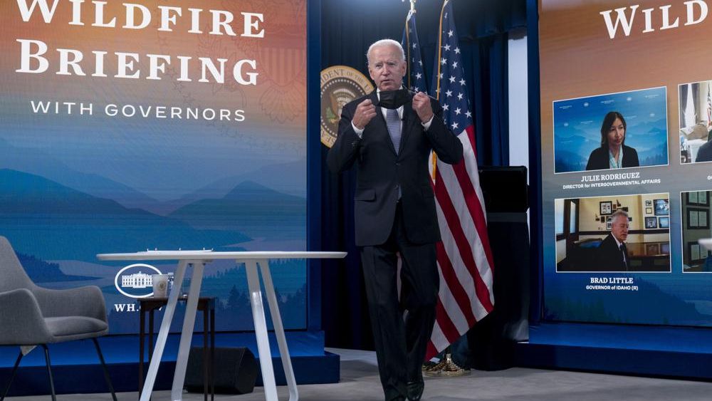 President Joe Biden arrives for a meeting with governors to discuss ongoing efforts to strengthen wildfire prevention, preparedness and response efforts, and hear firsthand about the ongoing impacts of the 2021 wildfire season in the South Court Auditorium in the Eisenhower Executive Office Building on the White House Campus in Washington, Friday, July 30, 2021. (AP Photo/Andrew Harnik)