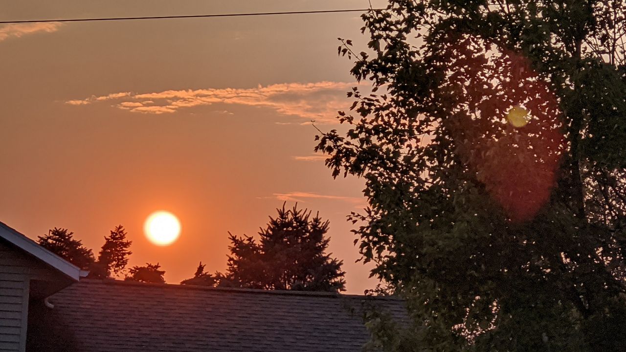 Haze lingers over Kentucky due to wildfire smoke.