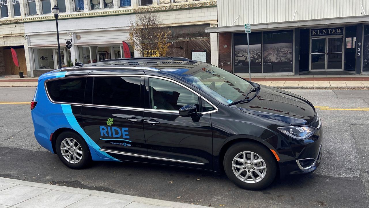 A van for RiDE, an on-demand micro-transit service for Wilson, N.C., is parked in the central North Carolina city. Wilson ended its bus service in September 2020 to offer on-demand van trips for less than $3 a ride. (City of Wilson via AP)