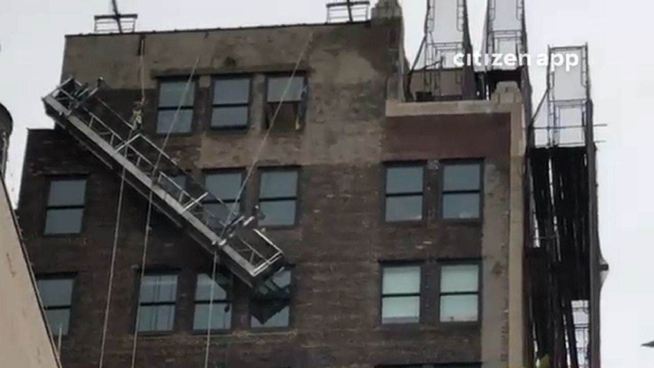 Pair of window washers rescued from Chelsea building