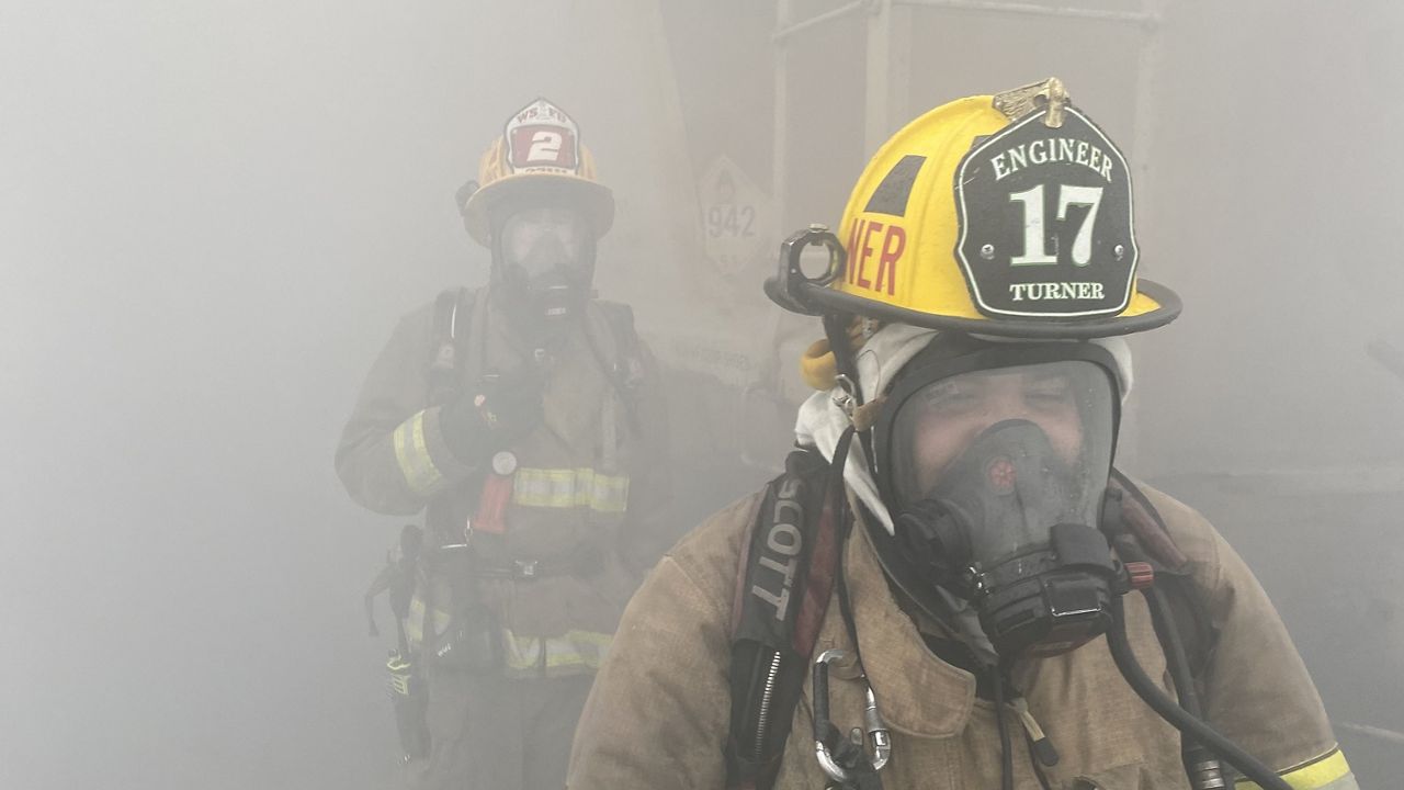 Winston-Salem firefighters are working on the site of a fertilizer plant that caught fire. There is a lower threat of explosion from the ammonium nitrate as the chemical burns off and rain helps cool the blaze.