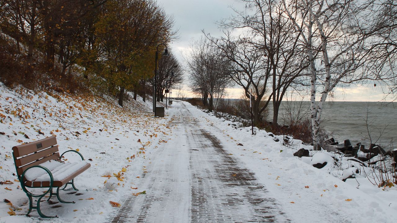 Snow and ice coats the path at Lakewood Park in Lakewood, Ohio. (Spectrum News 1/Lydia Taylor)