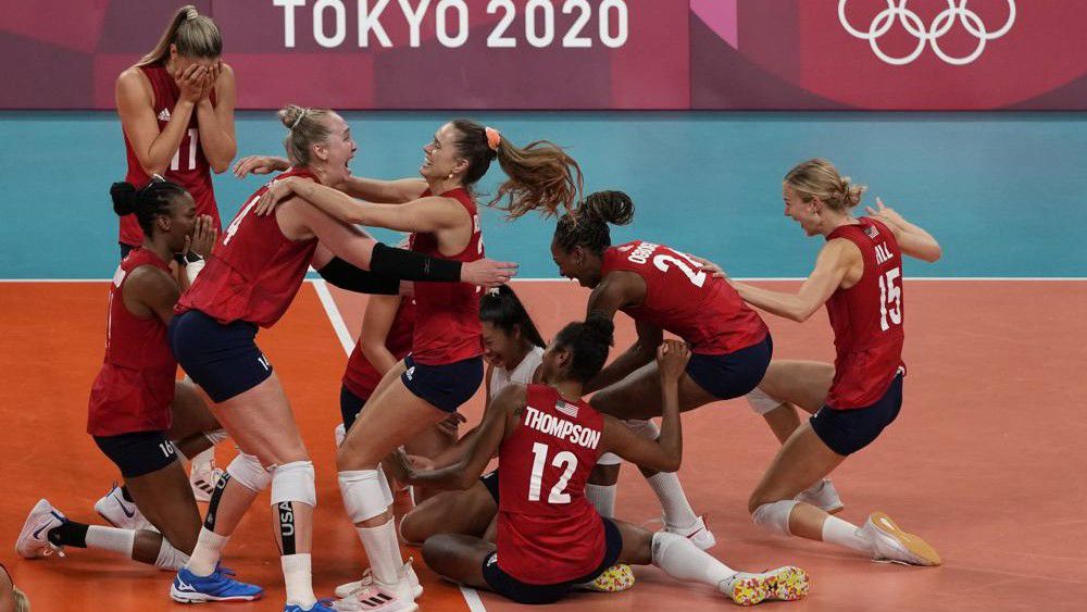 Players from the United States react after defeating Brazil to win the gold medal in women's volleyball at the 2020 Summer Olympics, Sunday, Aug. 8, 2021, in Tokyo, Japan. (AP Photo/Frank Augstein)