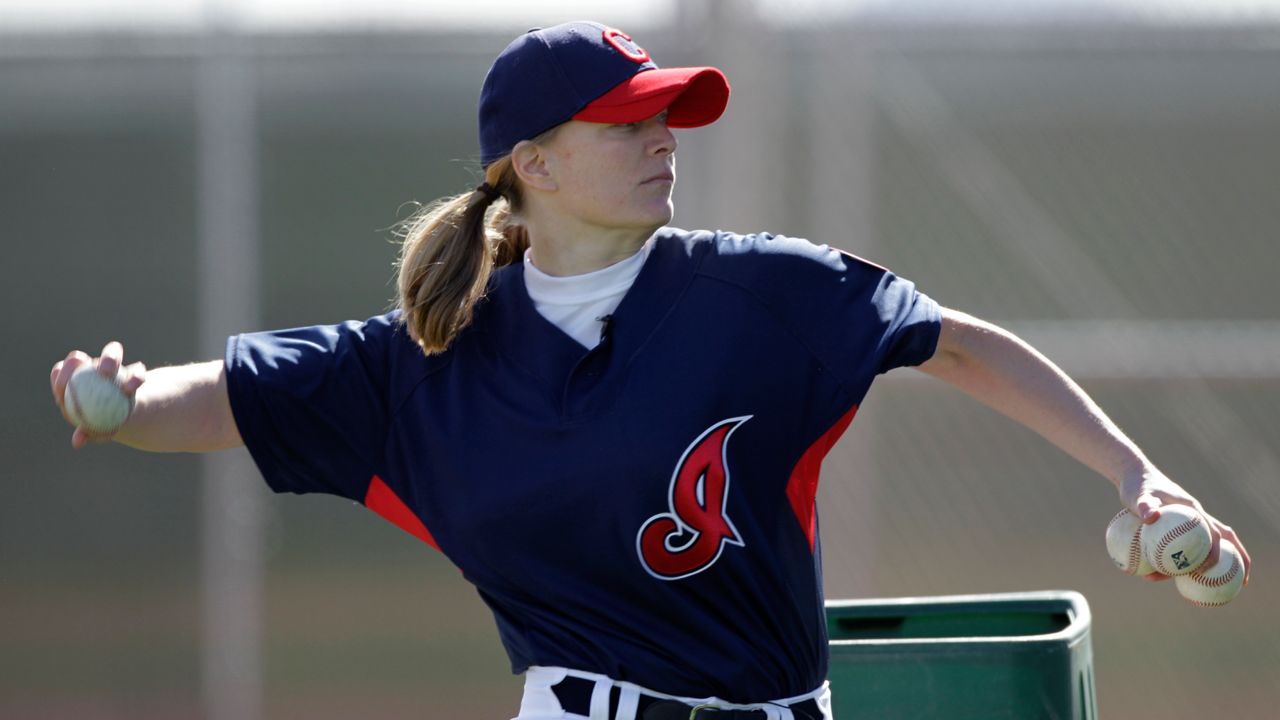 Justine Siegal throws during batting practice to Cleveland Indians minor leaguers during spring training, Feb. 21, 2011, in Goodyear, Ariz. 